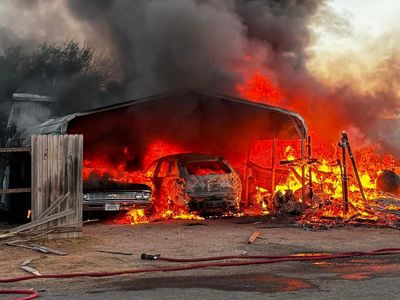 Two dead and buildings aflame after small plane crashes into Texas town