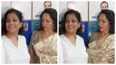 Hema Malini gets uncomfortable as woman touches her at event; scolds her saying 'Haath Nahi...'