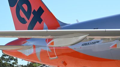 Shoving and screams as man opens plane's emergency exit