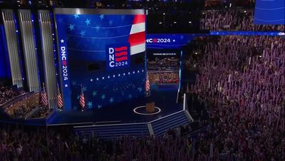 Tim Walz says 'we'll turn the page on Trump' as he rallies Democrats as Oprah Winfrey makes surprise speech