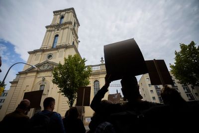 German president inaugurates the rebuilt tower of a church with Nazi-era historical baggage