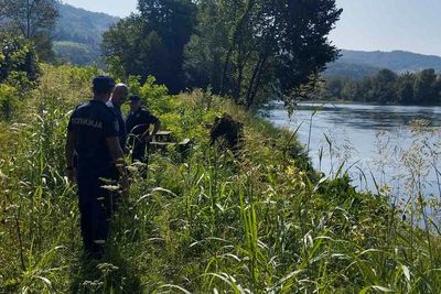 At least 8 people drown after migrant boat overturns while crossing a river from Serbia to Bosnia