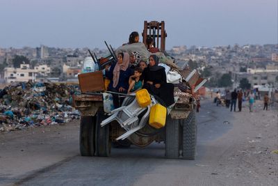 Palestinian families flee tanks and drones as Israel intensifies assault in two Gaza cities