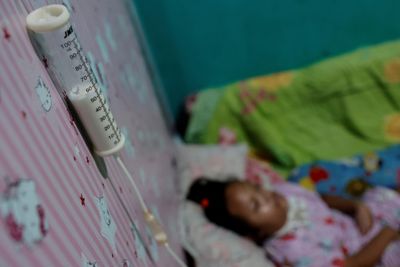 Indonesian court orders cash payments to toxic cough syrup families