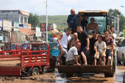 Heavy rainstorms killed 11 people and left 14 others missing in northeastern Chinese city