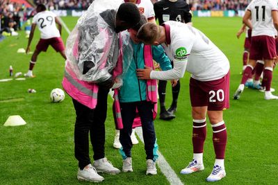 West Ham duo free ball boy from under collapsed hoarding amid fan celebrations