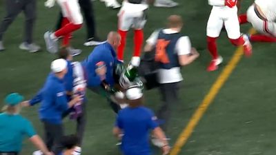 Jets Running Back Xazavian Valladay Bulldozed a Giants Coach on the Sideline