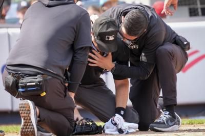 Umpire Hit By Shattered Bat In Yankees-Rockies Game