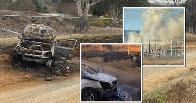 Burning car sparked a large grassfire behind electrical substation: police