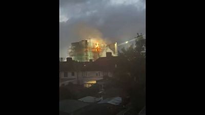 Watch: Huge fire rips through block of flats in east London