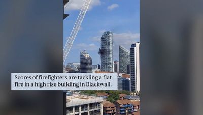 Blackwall fire: 70 firefighters tackle blaze at London skyscraper that sends huge plume of smoke across sky