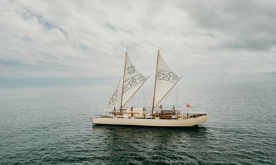 ‘Even in the teeth of a gale, she has time for a hula’: the sailor breaking barriers on the Pacific ocean