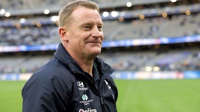 Carlton coach tackles car thief during his coffee run