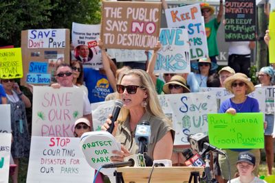 Opponents stage protests against Florida state parks development plans pushed by DeSantis