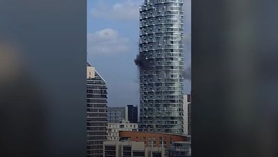 Skyscraper fire in east London was caused by smoking