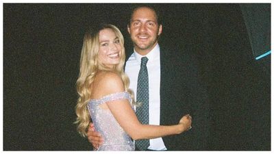 Pregnant Margot Robbie shows off her baby bump on a Sardinian getaway with husband Tom Ackerley: Pics Inside