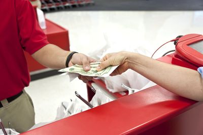 Retailers made millions charging you cash back fees, report says