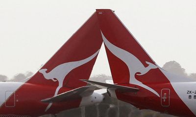 Qantas profit down 16% to $2.1bn as surging demand for cheap fares helps Jetstar