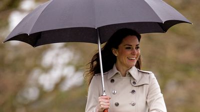 Kate Middleton's short Burberry trench coat with opaque black tights and stiletto heels is a look that will never go out of style