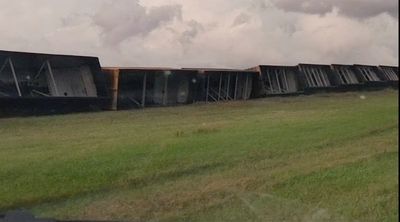 High winds, possibly from a tornado, derail 43 train cars in North Dakota