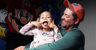 Brave little Sadie shows Dad strength is about more than muscles