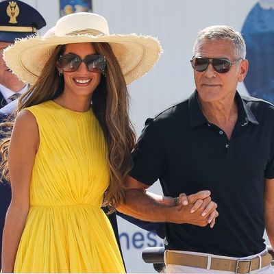 Amal Clooney Leans Into the "Eurocore" Aesthetic In a Yellow Sundress at the Venice Film Festival