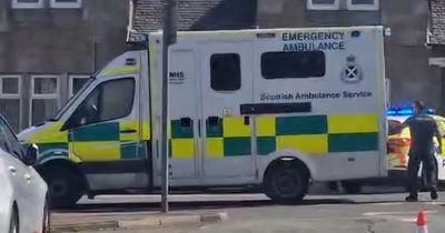 Hunt launched for car that fled scene after colliding with police officer