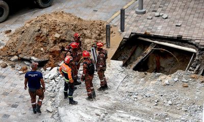 Search for tourist swallowed by sinkhole in Kuala Lumpur stalls amid safety fears