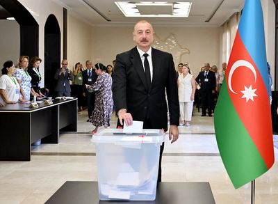 Azerbaijan’s ruling party on course for narrow victory, exit poll shows