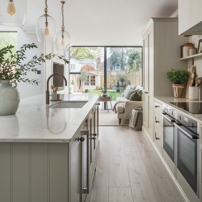 Should a kitchen floor match worktops? Kitchen experts explain the pros and cons of a matchy-matchy look