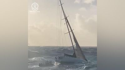 Extremely lucky yacht duo 'glad to be back' on dry land