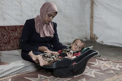 ‘He can’t move at all’: A Gaza mother’s agony over baby with polio