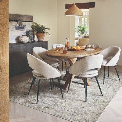 How big should your dining room rug be? Experts share the secret to choosing the perfect size rug for your dining space