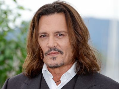 Johnny Depp shows off major dental transformation after shocking fans with ‘rotting’ teeth