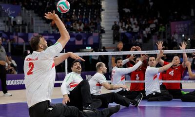 Not-so-secret weapon: world’s second-tallest man leads Iran into sitting volleyball final