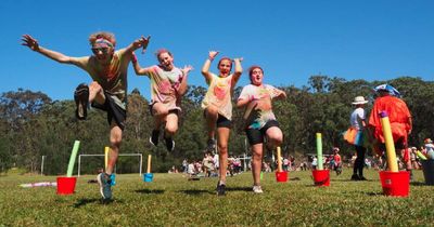 'Best day ever': students glide through slime pit on colour run