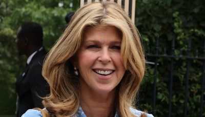 Kate Garraway's printed midi dress and cream cardigan made the perfect cosy outfit for her day of gardening