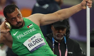 ‘We are freed in Gaza by sport’: shot putter flies Palestinian flag at Paralympics