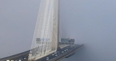 Breathtaking photo shows 'wall of fog' on iconic Scottish bridge