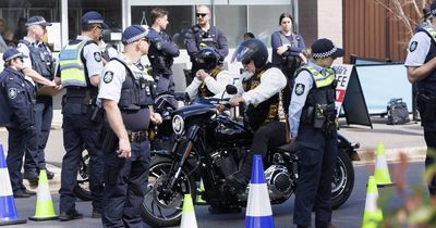 Police maintain close overwatch as 150 Comancheros roll into Canberra