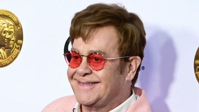 Elton John sheds a tear after world premiere of intimate documentary in first public appearance since announcing vision loss