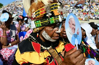 Sporting A Feathered Headdress, Pope Francis Finds 'Eden' In Papua New Guinea