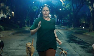 Nightbitch review – Amy Adams turns into a dog in rough dark comedy