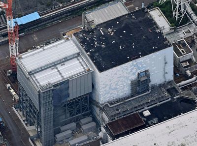 A robot resumes mission to retrieve a piece of melted fuel from inside a damaged Fukushima reactor