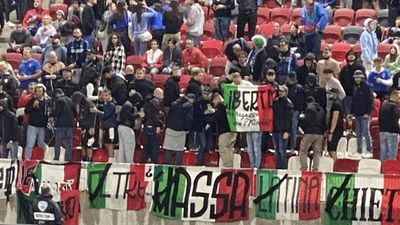 Italian fans turn their backs during Israel national anthem before Nations League match in Hungary