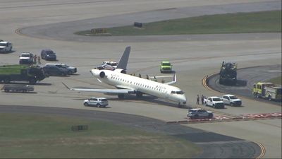 Two Delta planes collide on an Atlanta taxiway, knocking the tail off one