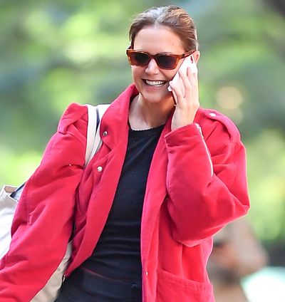 Katie Holmes Pairs Classic Ballet Flats With a Bright Red Twist on the Barn Jacket Trend