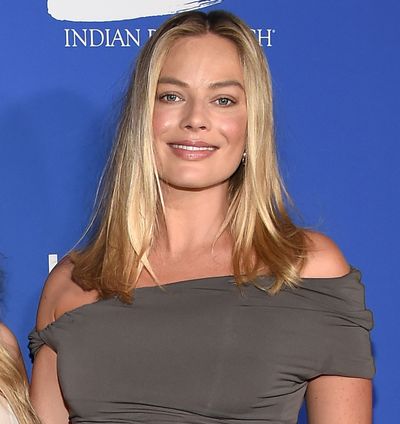 Margot Robbie and Her Baby Bump Make Their Red Carpet Debut in a Skintight Maternity Mini Dress