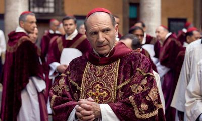 Conclave review – Ralph Fiennes takes charge of tense papal election thriller