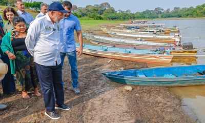 Brazilian president flies into Amazon amid alarm over droughts and wildfires